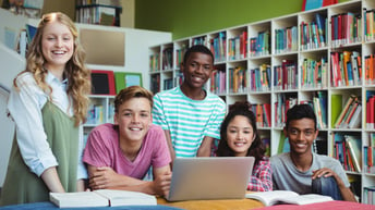 Portrait of happy students in library